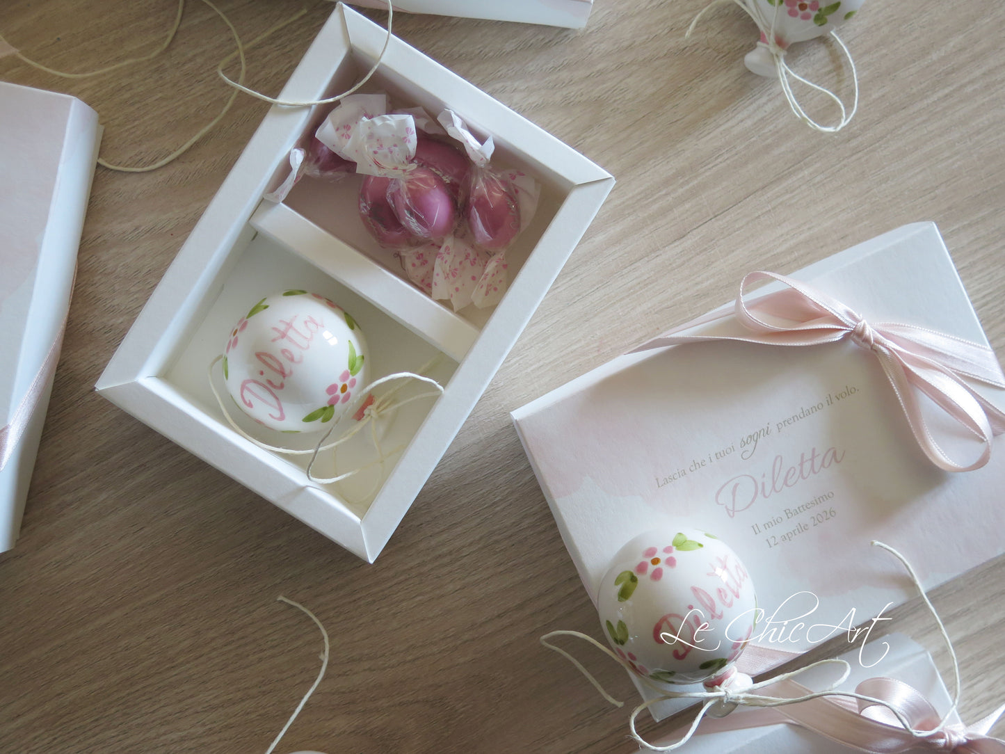 Small, rounded christening balloon favor set with name
