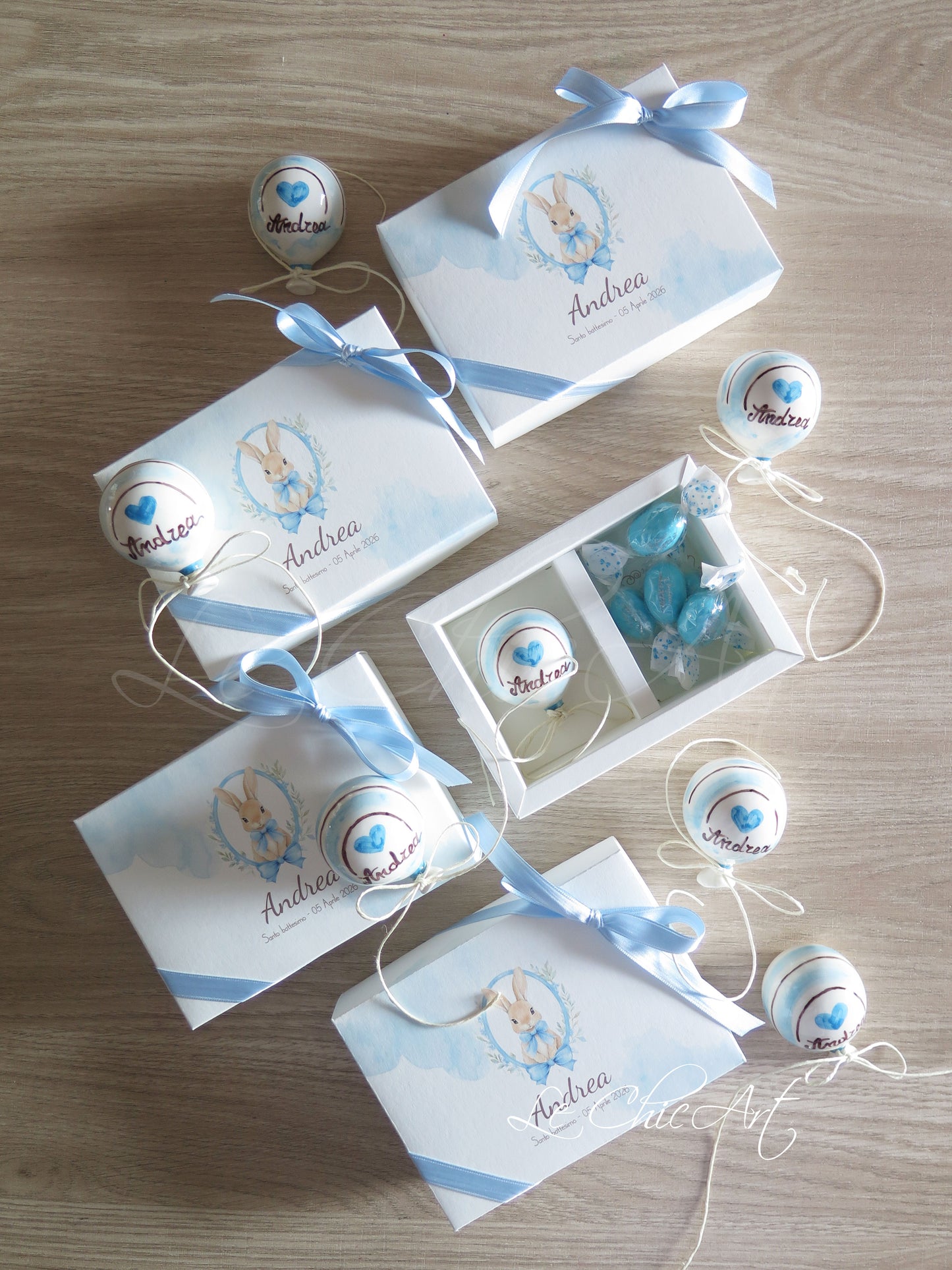 Small, rounded christening balloon favor set with name