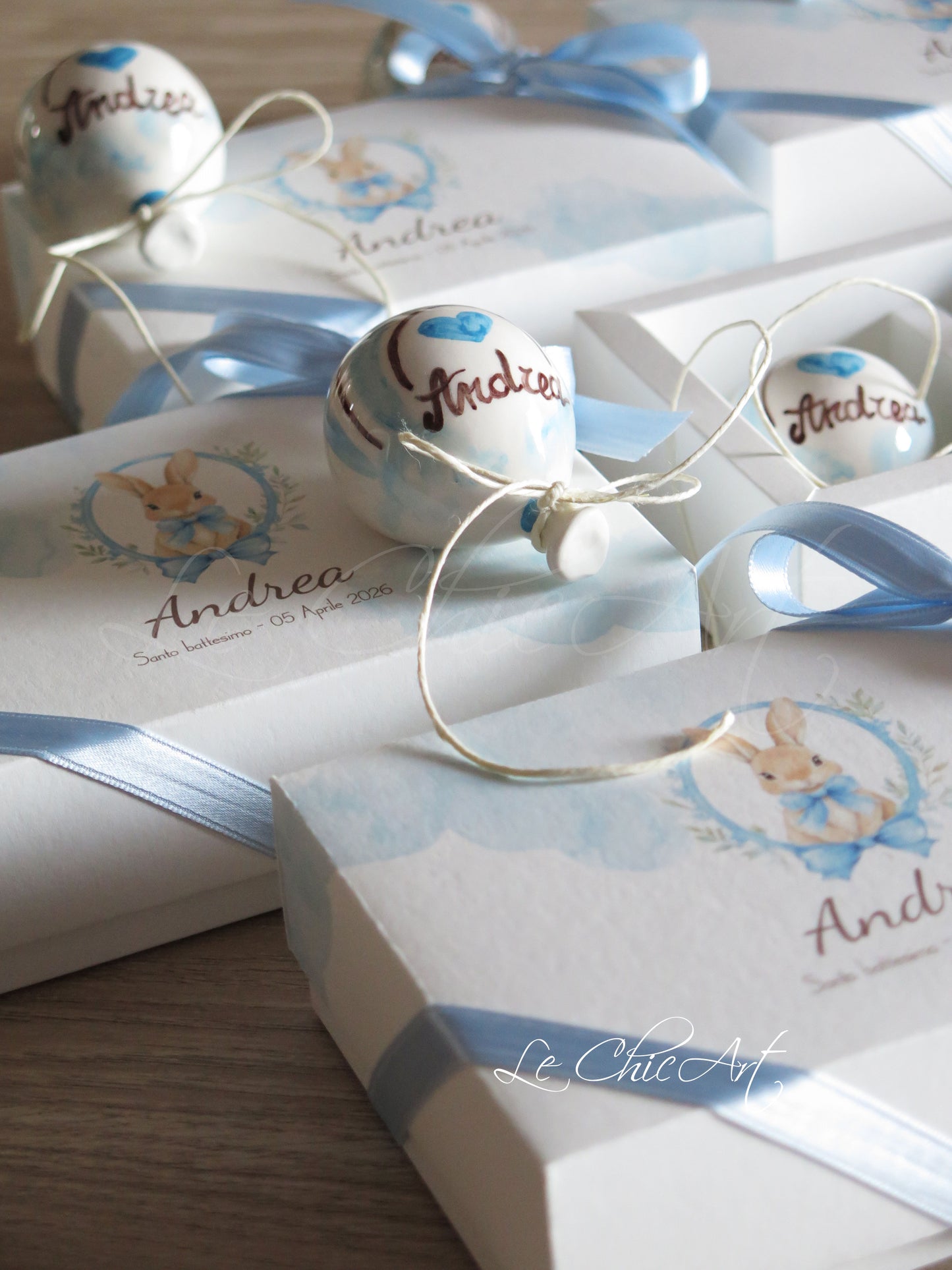Small, rounded christening balloon favor set with name