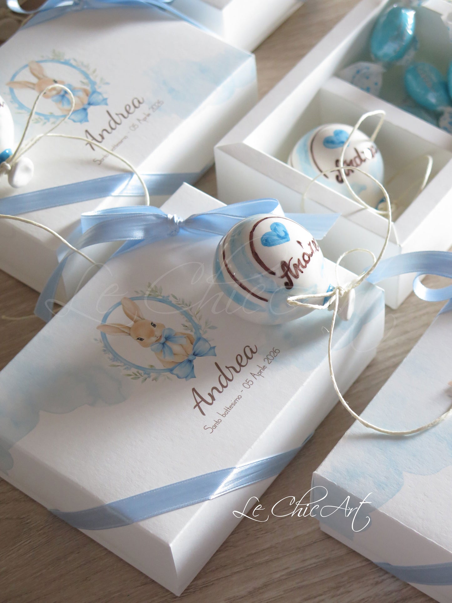 Small, rounded christening balloon favor set with name