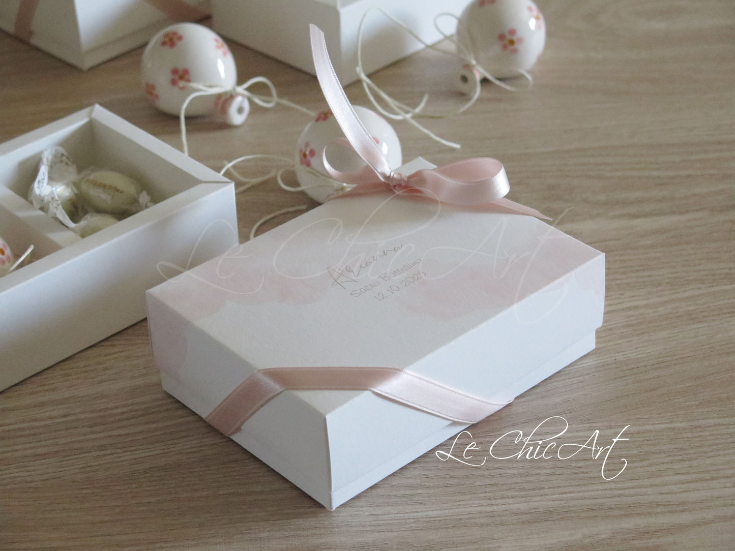 Small, rounded christening balloon favor set with name