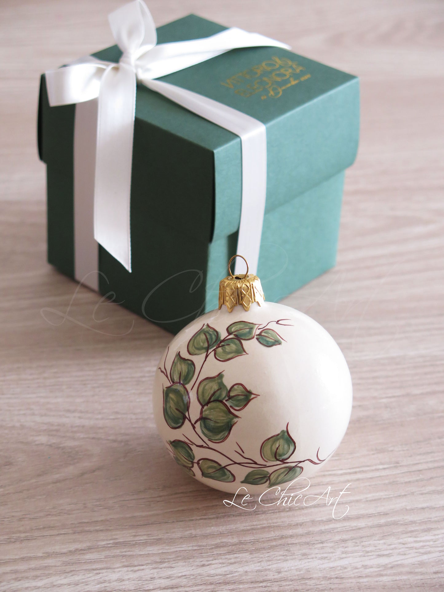 Bomboniera promessa matrimonio palla ceramica sabbia eucalipto dipinto a mano scatola verde bosco oro laminato artigianato italiano luxury